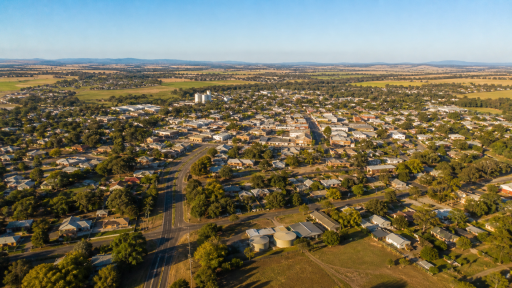 Moving for a new job tax benefits image by Six Brothers Removalists showing a regional NSW town aerial view